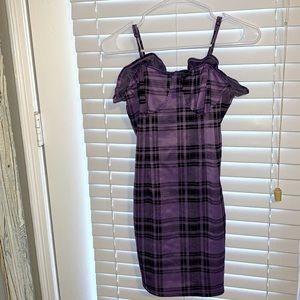 Purple and black skin tight dress with flares